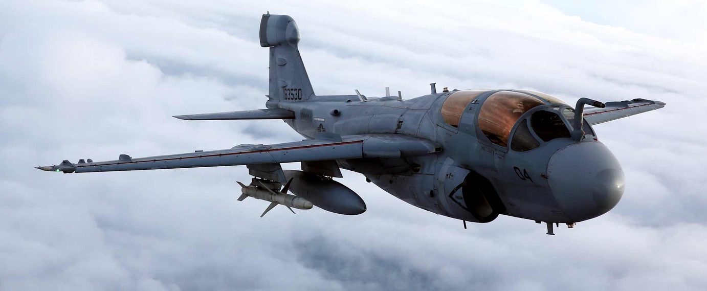 EA-6B Prowler in flight above the clouds